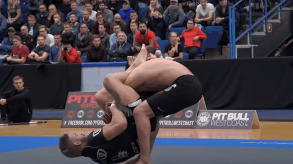 Two no gi bjj grapplers in a competition
