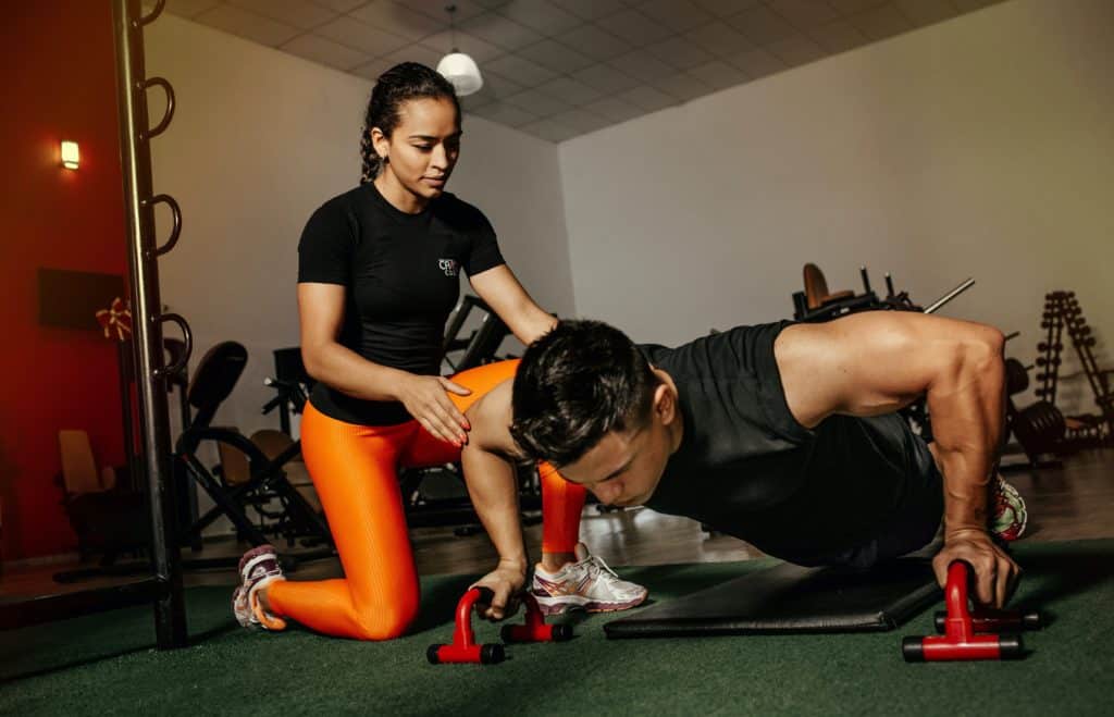 personal trainer with client
